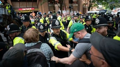 Protesters clash with police at demonstrations outside migrant hotels across UK