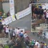 KIJK. “Ik kan dit niet geloven”: ophef in Frankrijk over “respectloze” wielerfans die op graven staan om Tour-peloton beter te zien