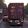 Moment reckless driver attempts dangerous overtake of huge lorry on motorway before being dramatically WIPED OUT in the middle of the road