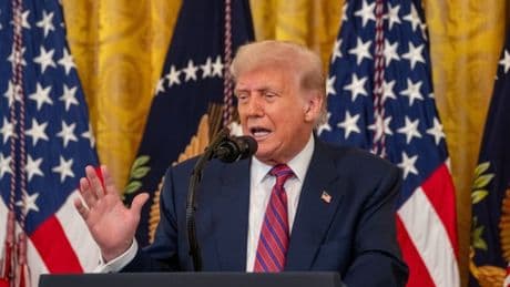 Trump ignores Epstein questions at signing of Genius Act he says was ‘named after me’