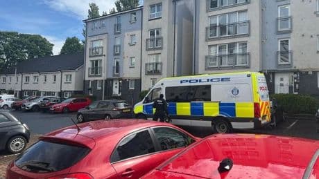 Man arrested after armed cops lock down Edinburgh street