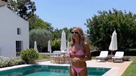 Amanda Holden, 54, sends fans wild with her latest bikini pics as she struts round pool