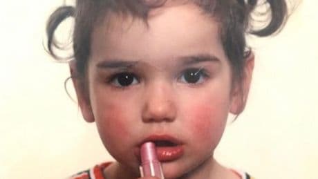 Huge popstar unrecognisable trying lipstick as angelic toddler