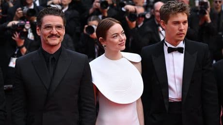 Emma Stone and Pedro Pascal pose on Cannes red carpet for Eddington premiere
