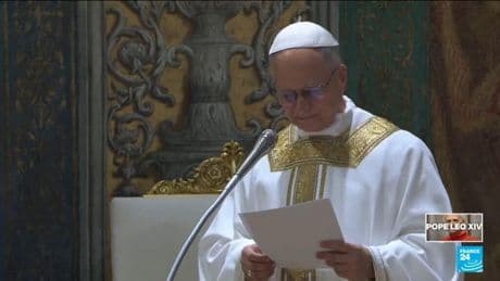 Chicago-born Pope Leo XIV offers a few words in English at his first Mass