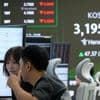 Asian shares track rally on Wall Street that won back most of Friday's wipeout