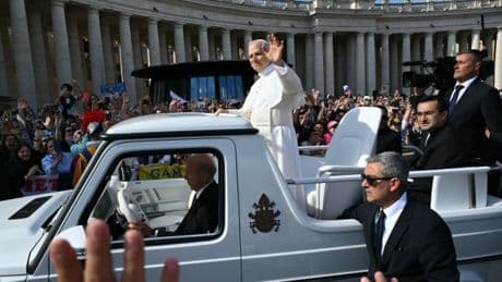 Pope Leo waves and blesses babies during first official ride on popemobile
