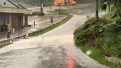 Thousands of motorists stranded for up to eight hours after heavy rains trigger mudslides in West Virginia