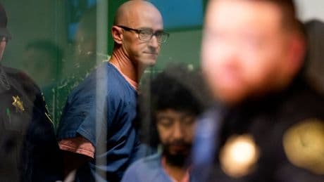 Ex-pilot accused of trying to cut a passenger flight’s engines reaches plea deals, his lawyer says