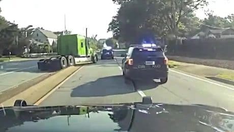 Semi truck driver takes cops on wild wrong-way chase before crashing into garden