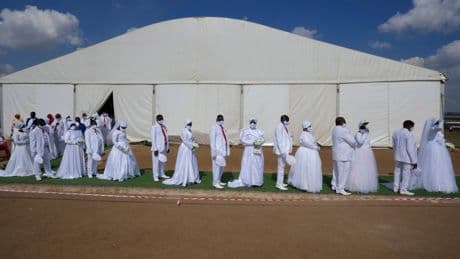 A Pentecostal church in South Africa holds mass Easter weddings for 3,000 people, some polygamous