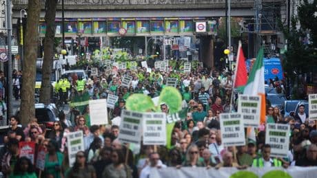 Shouts for justice at Grenfell anniversary march before tower demolition begins