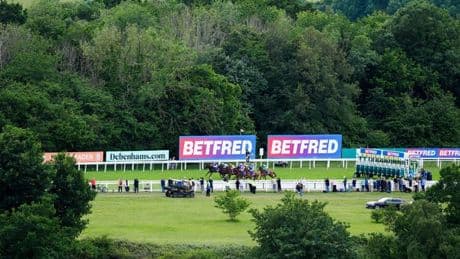 Epsom security stop Derby pub drinkers staging race over track