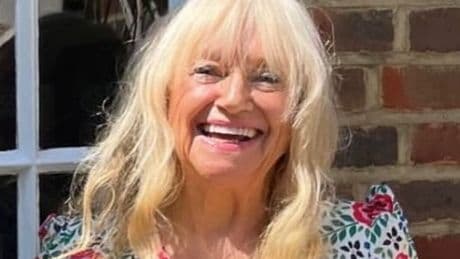 Judy Finnigan makes rare public outing as she beams at birthday get-together