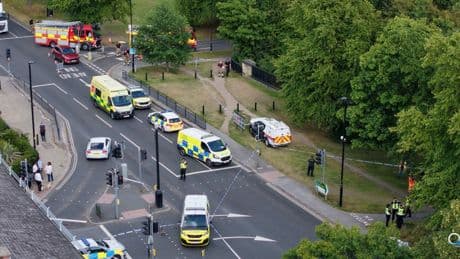 Man in his 70s dies after car falls down embankment and crashes onto train tracks as busy rail route closed