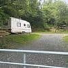 Families win fight to stop travellers building a pitch on a Welsh beauty spot after over 300 objections fly in