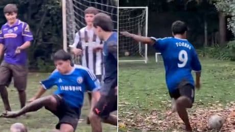 Man City legend's son wears Chelsea kit as he shows off impressive skills while playing barefoot in the garden