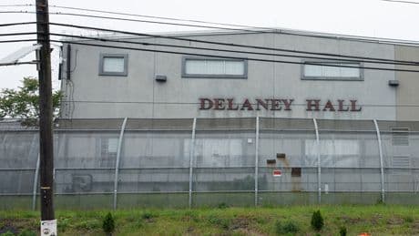 Law Enforcement Officers Respond to Reports of Unrest at Migrant Facility