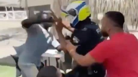 Brit tourists run for cover as Marbella street vendors brawl with cops at beach bar