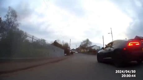 Shocking moment road-rage driver ‘whips out SWORD’ in terrifying confrontation with lone motorcyclist