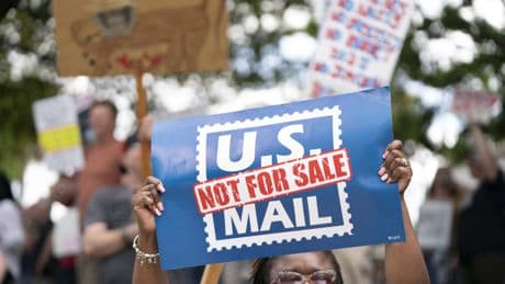 New U.S. Postal Service head says he doesn't believe in privatizing the mail agency