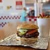 American divides opinion after claiming he was THROWN OUT of UK restaurant for eating a burger too slowly