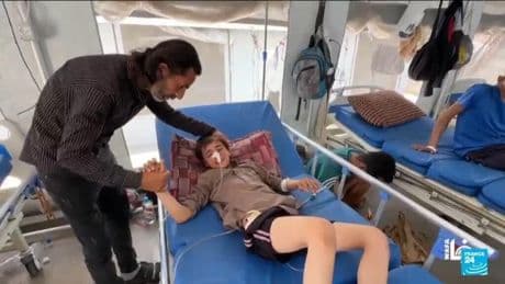 Children shot and wounded at aid distribution centre in Gaza