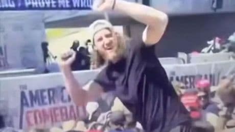 Man seen cheering after Charlie Kirk shot dead claims he was 'trying to save lives'