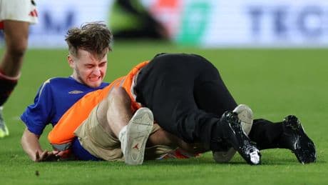 Chelsea vs Man Utd pitch invader ‘SPEARED’ as Blues steward is likened to WWE icon