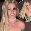 Britney Spears suffers MAJOR wardrobe malfunction as she models plunging dress for fans
