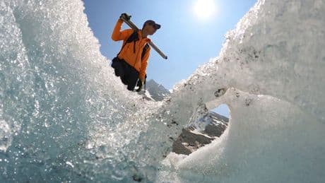 Switzerland's ebbing glaciers show a new, strange phenomenon: Holes reminiscent of Swiss cheese