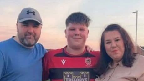 Rugby player stabbed 10 times in front of girlfriend 'half an inch' from death