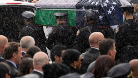 Grief Pervades a Somber Farewell to a Slain Police Officer
