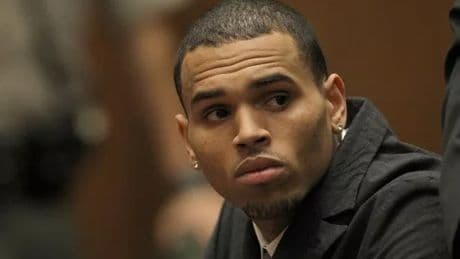 Chris Brown arrested at Manchester hotel over alleged bottle attack