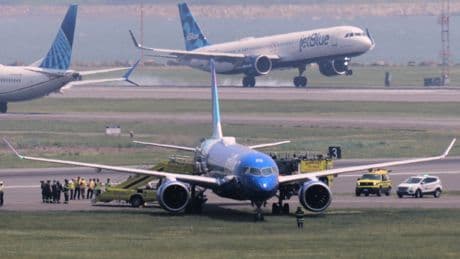 JetBlue flight from Chicago rolls off runway and into grass in Boston