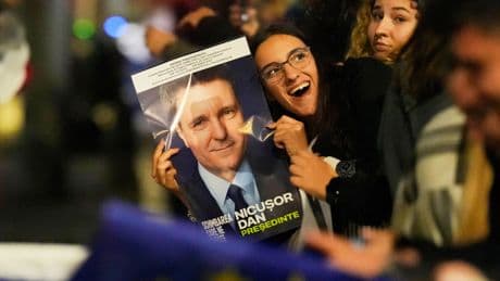 Centrist wins Romania's tense presidential race over hard-right nationalist