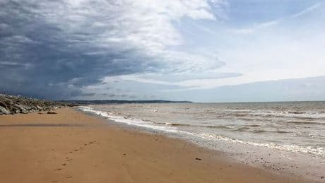 Pretty little UK seaside village with mini railway and huge 3-mile beach