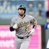 Athletics end 14-game road losing streak, beat Royals 6-4