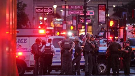 A shooting at a midtown Manhattan office building, in photos