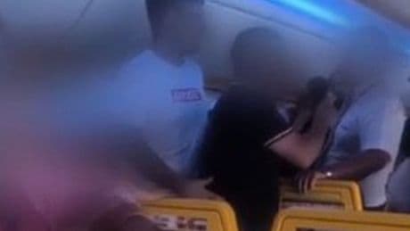 Shocking moment huge brawl breaks out on Ryanair flight over child screaming