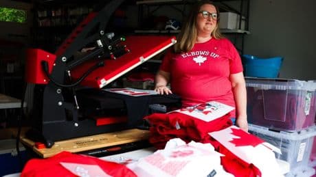 Once popular ‘elbows up’ merch not a hot seller for Canada Day, vendors say