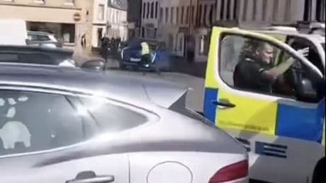 Shocking moment car 'knocks down police officer' on Scots road before arrest made