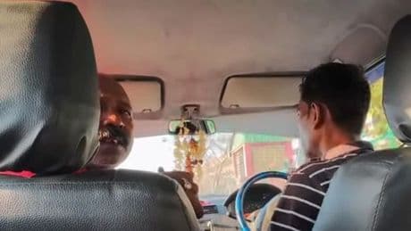 Chilling moment taxi driver threatens to 'break tourist's bones' on dark detour
