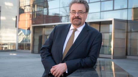 Former Dundee University boss paid six months' salary as he quit