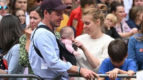 Princess Beatrice dotes on baby daughter on family outing to Lionesses' victory parade