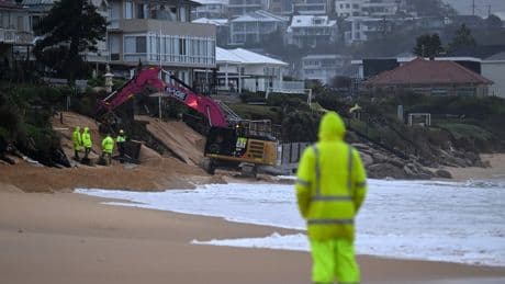 Australia bomb cyclone live: Flood emergency warnings issued as strong winds leave thousands without power