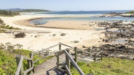 Teenage boy in serious condition after shark attack at famous beach