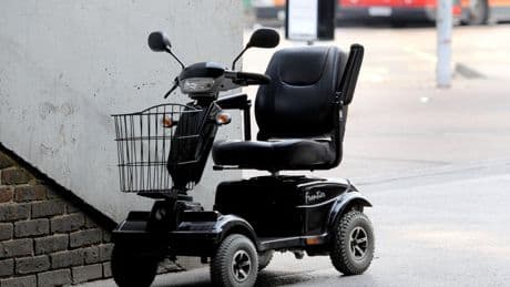 Man in his 70s arrested after mobility scooter driver allegedly punched in head