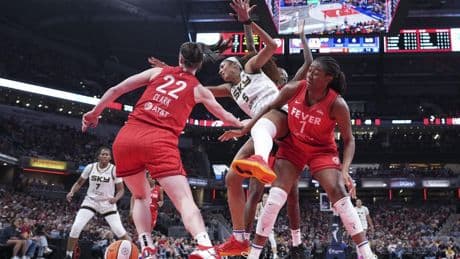 WNBA investigating racial slurs by fans made at Sky's Reese during Fever game