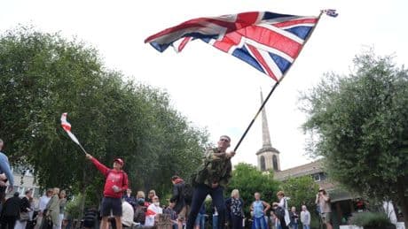 Protesters clash outside London migrant hotel